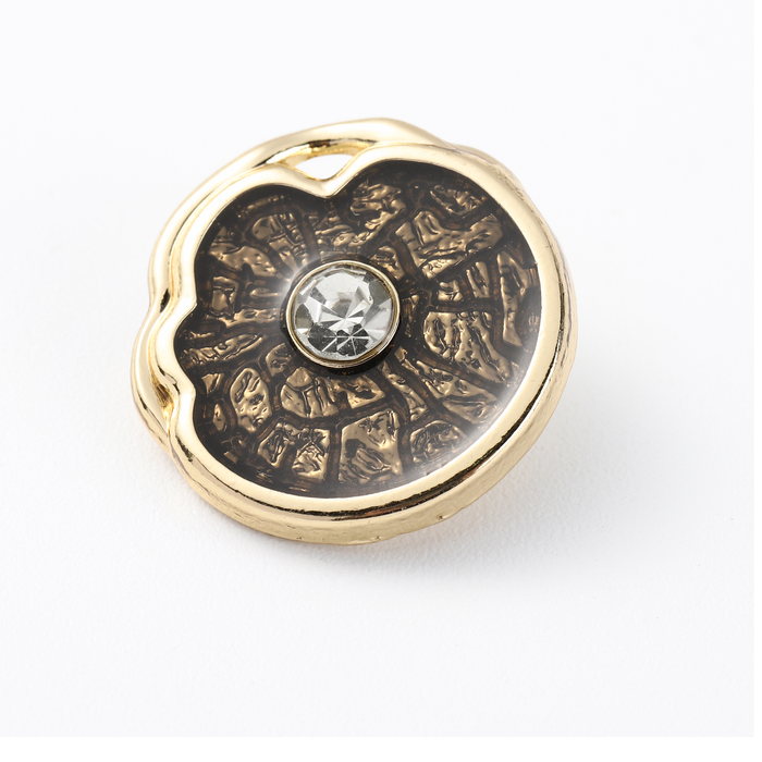 Gold heart-shaped button with printed inset