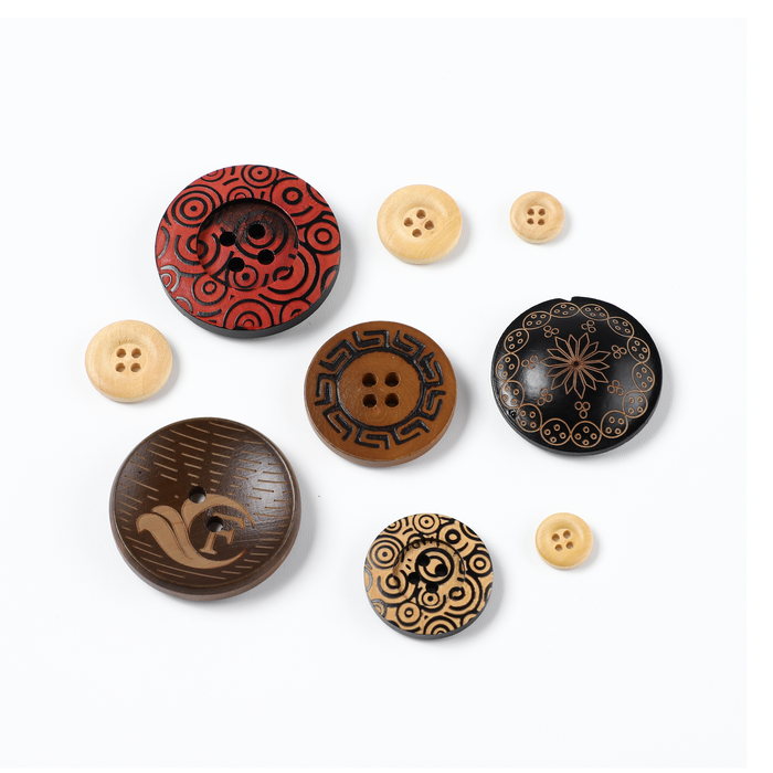 Resin buttons in red carved, brown and cream colourways