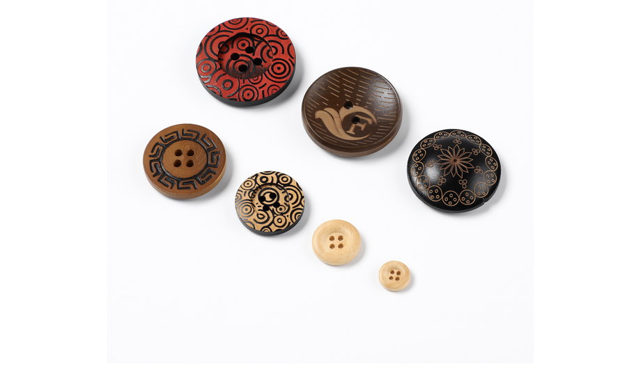 Plastic and resin buttons — red carved, black, brown and cream urea buttons